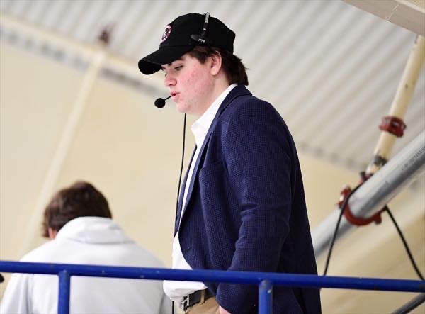 Jake Klein 23’ commentating a hockey game in Savage Johnson Rink.