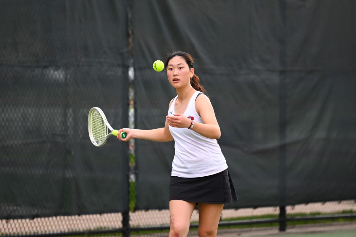Yichen Liu ’28 playing tennis.