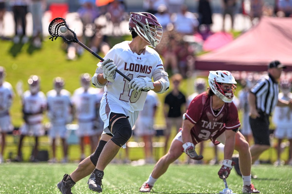 Michael Li in a lacrosse game against Taft last year