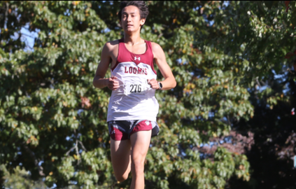 Alex Fisher '26 leading the pack on the LC Cross Country course
